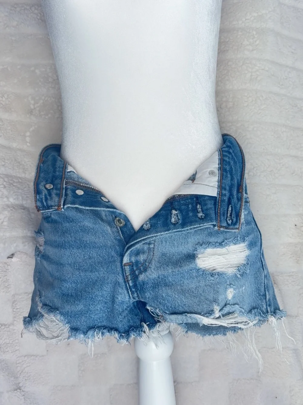 Levi's Light Blue Distressed Denim Cutoff Shorts - Picture 2 of 3